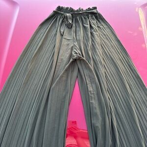 Green flowy pants with tie around the waist